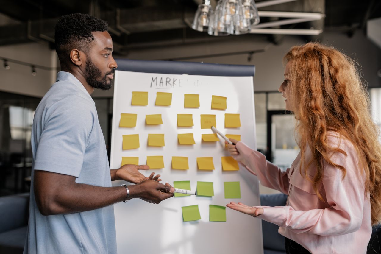 Mastering the First Impression A diverse team of professionals brainstorming marketing strategies in a modern office.
